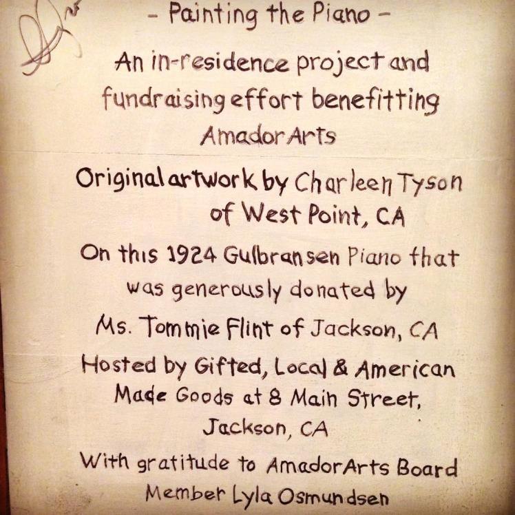 The dedication inscription that can be found on the back of the Painted Piano.